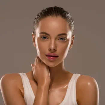 Beauty woman with hands healthy natural make up clean fresh skin concept color background